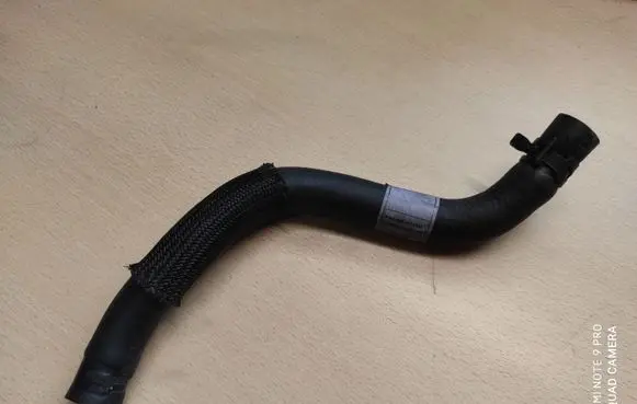 SsangYong Korando Engine coolant pipe/hose 6942034300