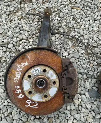 Volkswagen Touareg I Front wheel hub spindle knuckle 7L6407258A