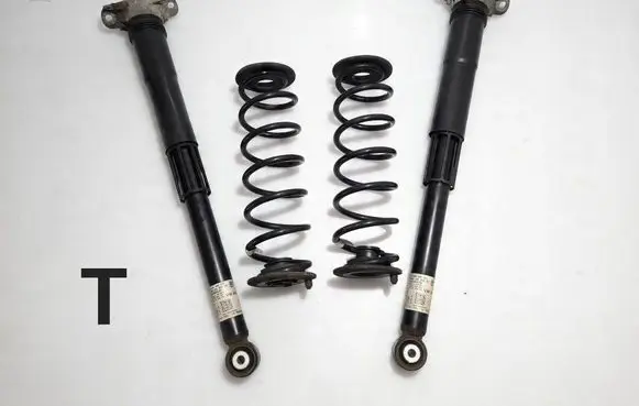Volkswagen Golf VII Front shock absorber with coil spring 5Q0512013EK