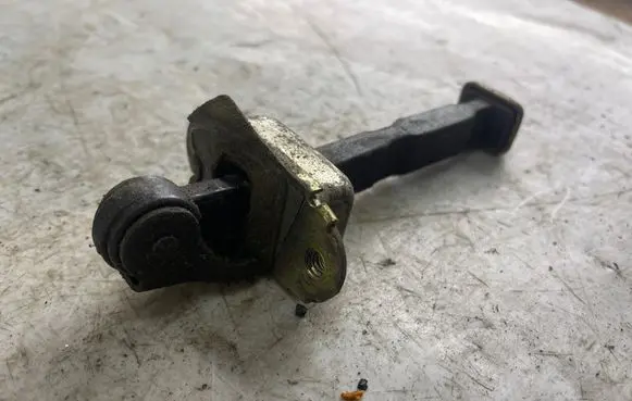 Nissan Patrol Y61 Front door check strap stopper 