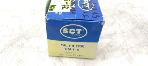 Ford Escort Oil filter mounting bracket SM110