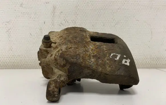 Nissan Almera N16 Front brake caliper 410112F021