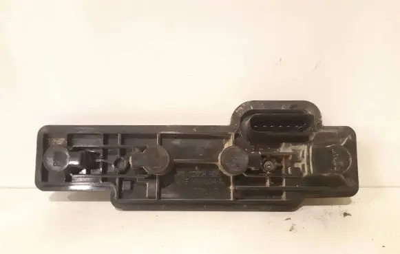 Tail light bulb cover holder