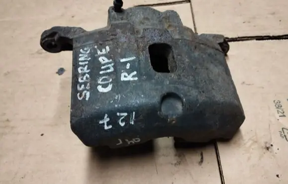 Chrysler Sebring (ST-22 - JR) Front brake caliper