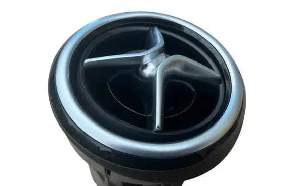 Dash center air vent grill