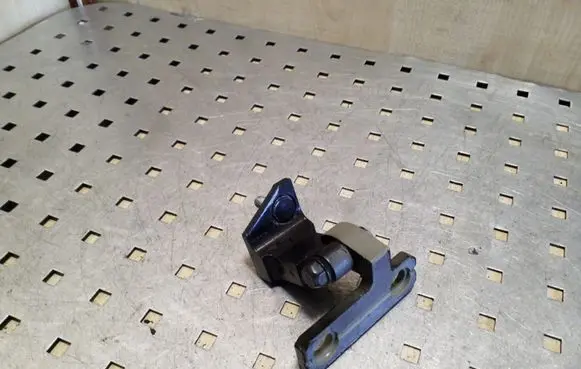Rear door upper hinge