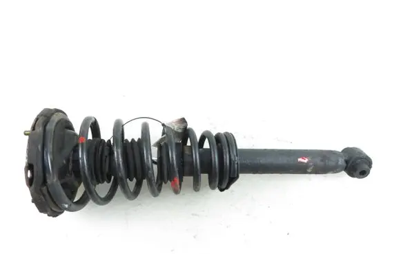 Nissan Primera Front shock absorber with coil spring