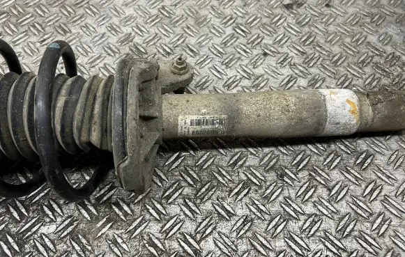 Front shock absorber with coil spring