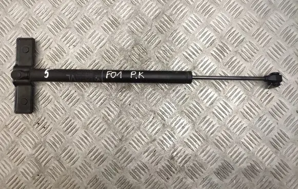 Front door check strap stopper