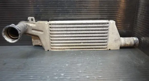 Opel Corsa C Intercooler radiator 24466787