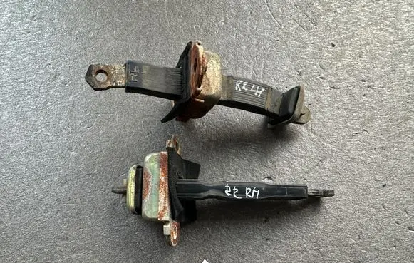 Nissan King Cab, Navara Rear door check strap stopper 82430VJ300