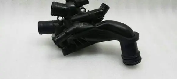 Thermostat/thermostat housing