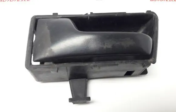 Volkswagen Golf II Front door interior handle 321837235A