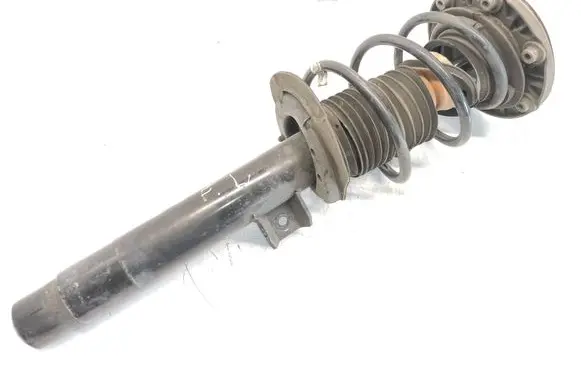 Front shock absorber with coil spring