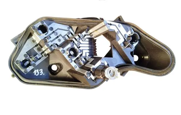 Tail light bulb cover holder