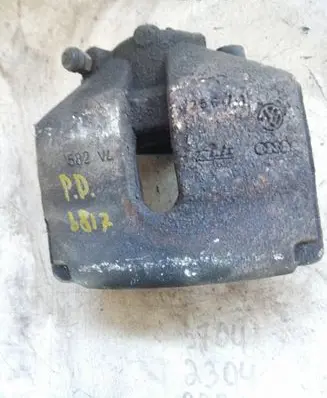Volkswagen Golf VI Front brake caliper
