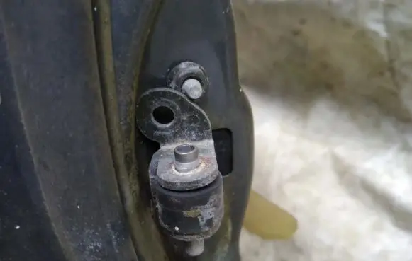 Rear door check strap stopper