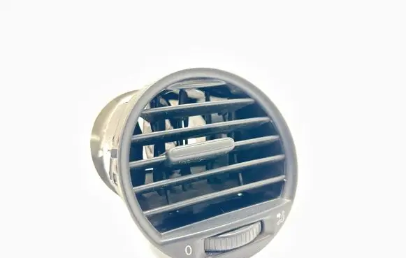 Volkswagen Caddy Dash center air vent grill 2K0819703B