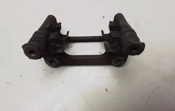Lancia Delta III Brake caliper pad carrier rear Y01254 2282