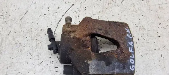 Volkswagen Golf VI Front brake caliper