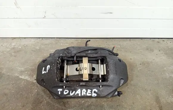 Volkswagen Touareg II Front brake caliper 7P6615105AE