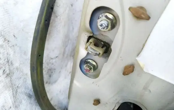 Mazda 626 Front door check strap stopper 
