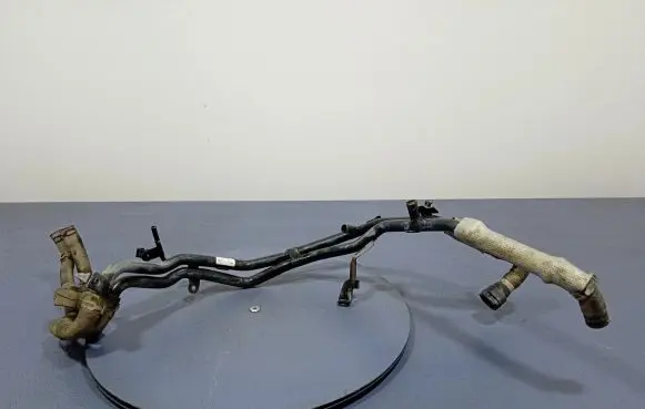 Volkswagen Touareg II Engine coolant pipe/hose 7P6121070BN