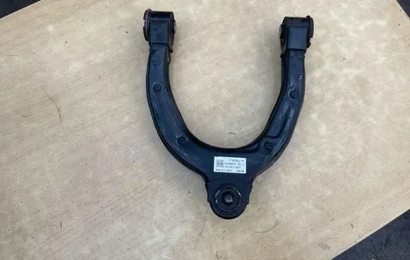 Tesla Model 3 Front lower control arm/wishbone 104432100J