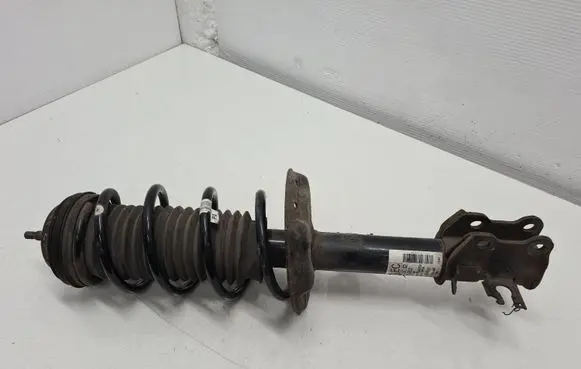 Opel Corsa D Front shock absorber/damper 13214353