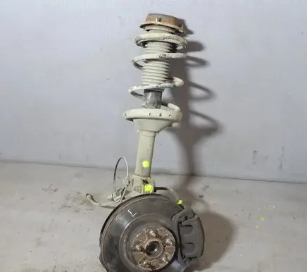 Subaru Outback Front shock absorber with coil spring