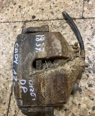 Volkswagen Caddy Front brake caliper 