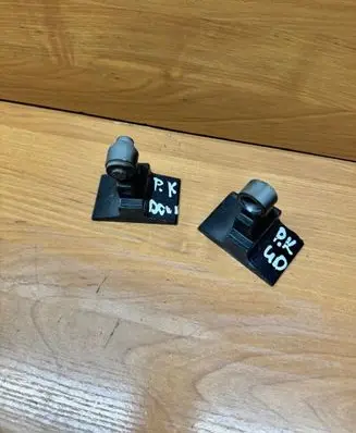 Front door lower hinge