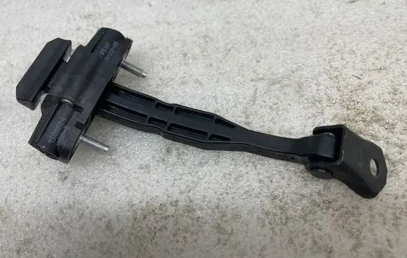 Rear door check strap stopper