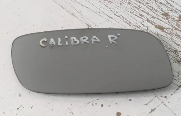 Opel Calibra Wing mirror glass E10117340