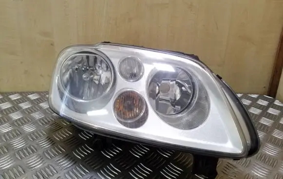 Volkswagen Touran I Headlight/headlamp 0301205602 1T0941006E