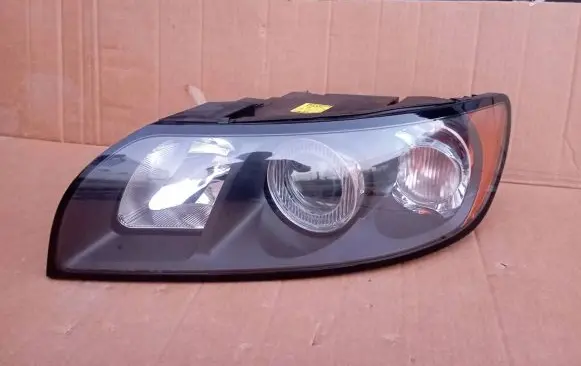 Volvo S40, V40 Headlight/headlamp 31213180 LE01A676 0301198001