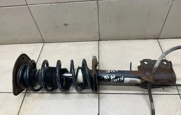 Mitsubishi Colt Front shock absorber with coil spring