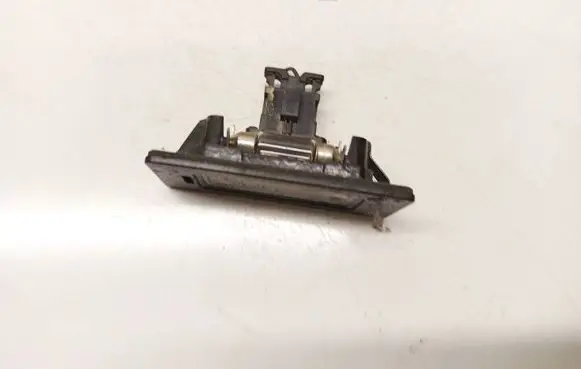 Volkswagen PASSAT B6 Number plate light 7PP943021