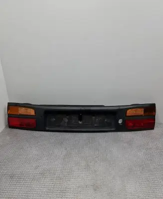 Renault Laguna I Trunk door license plate light bar 7700420119