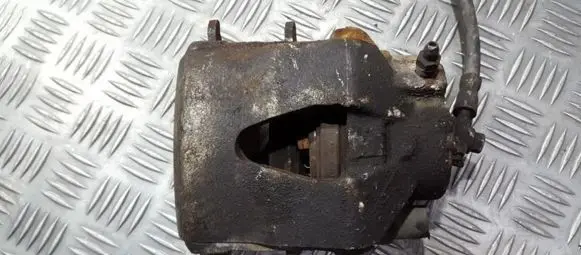 Volkswagen Golf V Front brake caliper