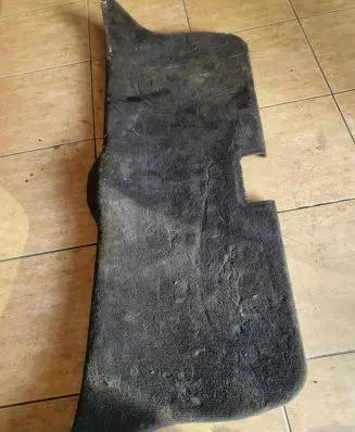 Trunk/boot lower side trim panel