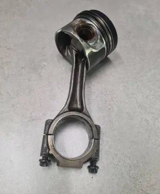 Piston with connecting rod
