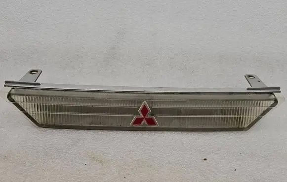 Mitsubishi Eclipse (D21A/D22A/D27A) Front bumper upper radiator grill MB479286