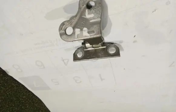 Front door lower hinge