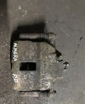 Nissan Almera N16 Front brake caliper