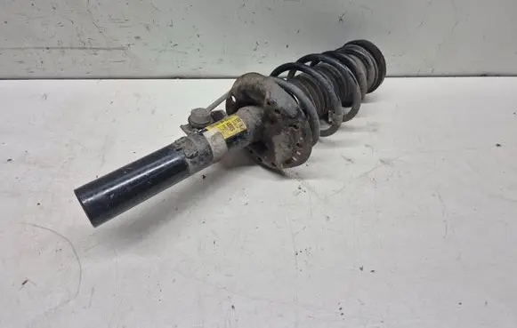 Opel Astra J Front shock absorber with coil spring 13390294
