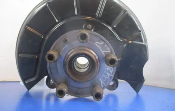 Volkswagen Touran I Front wheel hub spindle knuckle