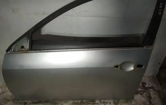 Nissan Primera Front door pilkos