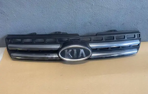 KIA Sportage Front bumper upper radiator grill 863501F030