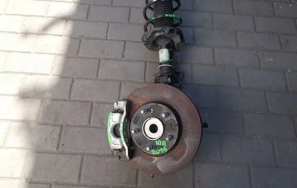 KIA Sportage Front wheel hub spindle knuckle ZWROTNICAMCPERSON